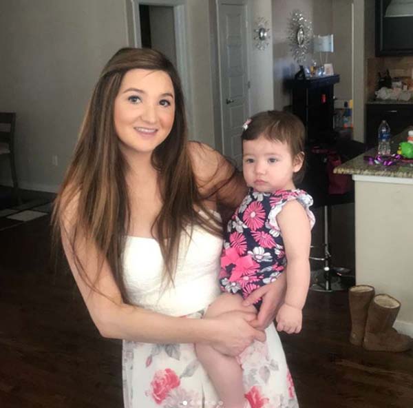 A picture of Desirae Lazar and her child.